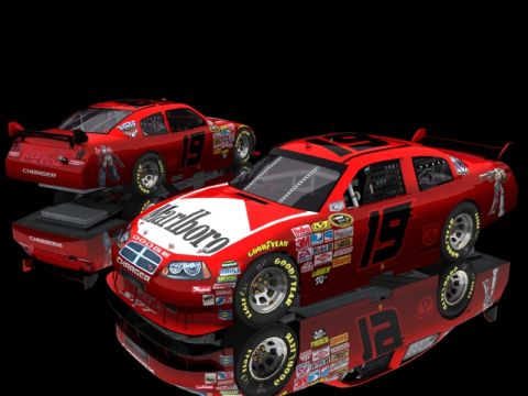 2004 Jeep Wrangler - Two red Dodge race cars with various sponsor decals are displayed against a black background.