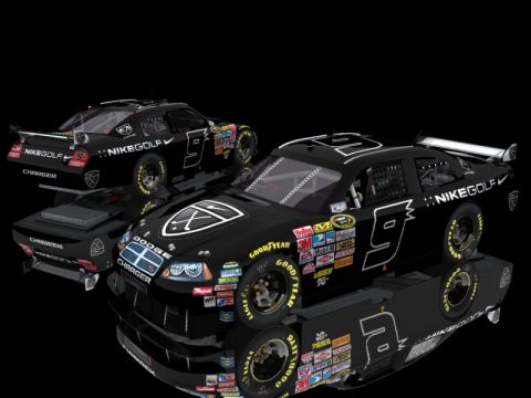 2004 Jeep Wrangler - Two black Dodge Charger race cars are displayed with various sponsor decals and the number 9.