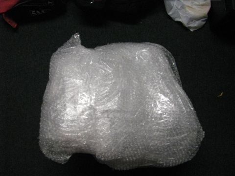 2003 Mercury Marauder - An engine intake manifold is wrapped in bubble wrap, ready for shipping or storage.