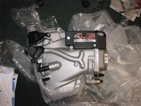 2003 Mercury Marauder - Engine intake manifold with "4.6 HIGH PERFORMANCE" marking, likely for a performance vehicle, not specifically a 2003 Mercury Marauder.