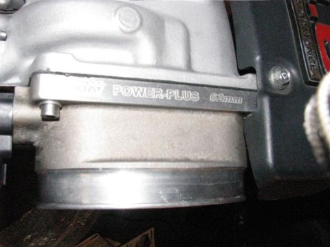 2003 Mercury Marauder - Close-up of a ported and polished intake manifold, identified as "POWER-PLUS 62mm".