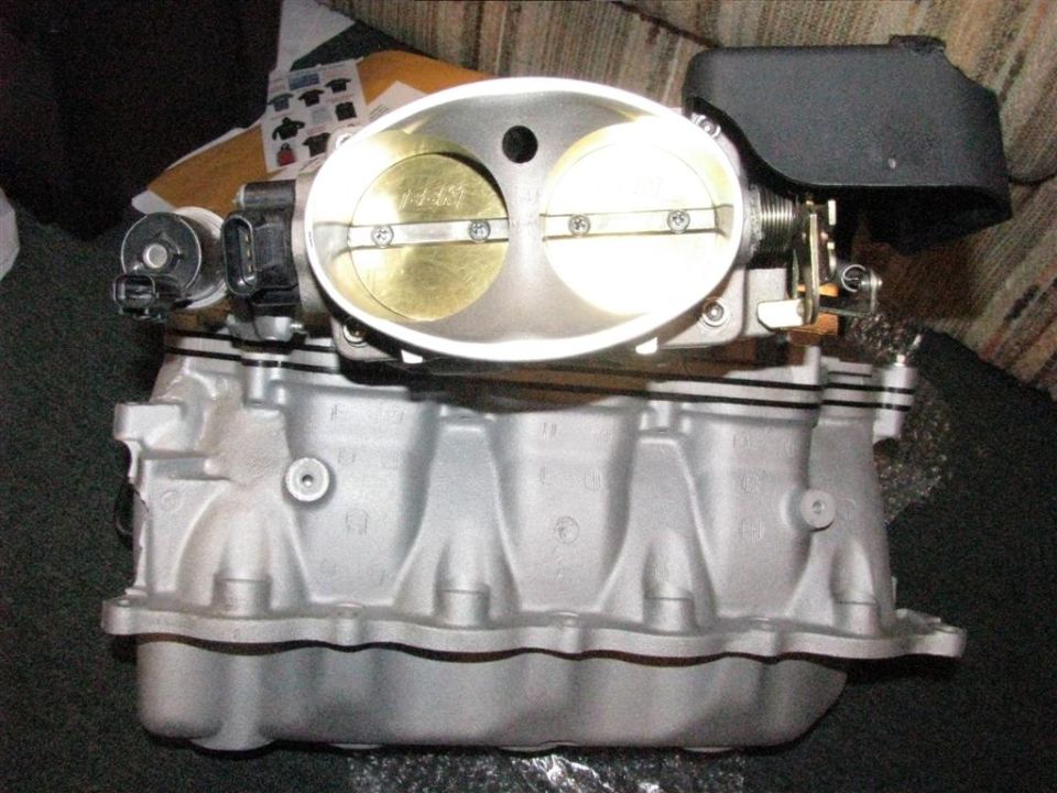 Engine intake manifold with dual throttle body assembly, silver aluminum
