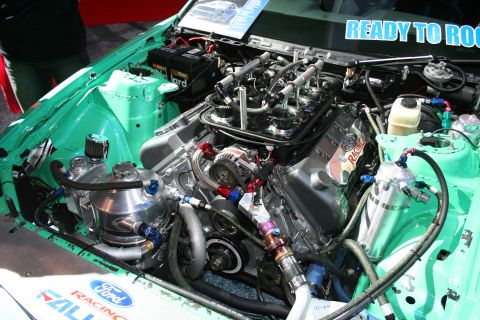 1998 Ford Crown Victoria - Customized engine bay Ford Racing components and a "READY TO ROCK" decal on the windshield.