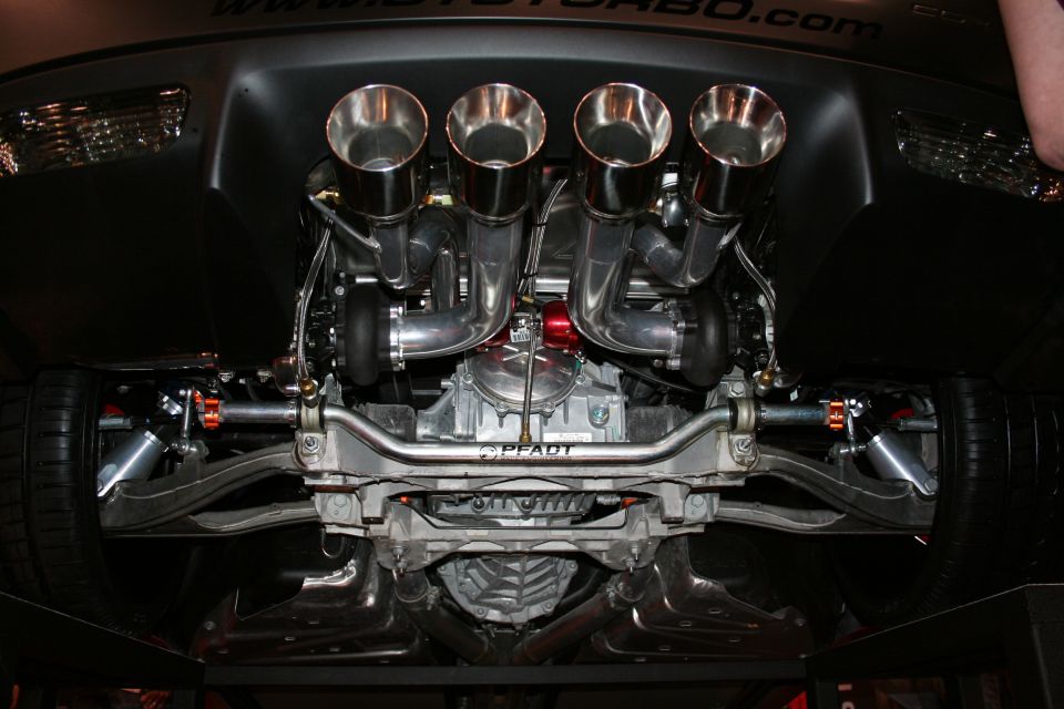Undercarriage view of quad exhaust pipes and twin turbochargers