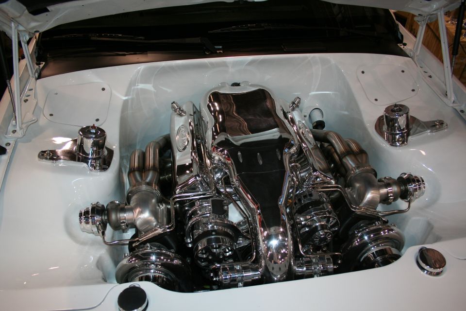 White engine bay with highly polished chrome engine components and twin turbochargers