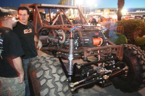 1998 Ford Crown Victoria - Custom off-road buggy with a winch and exposed engine components is displayed outdoors.