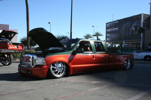 1998 Ford Crown Victoria - This customized Ford F-350 dually pickup truck features a two-tone paint job and extreme lowering.