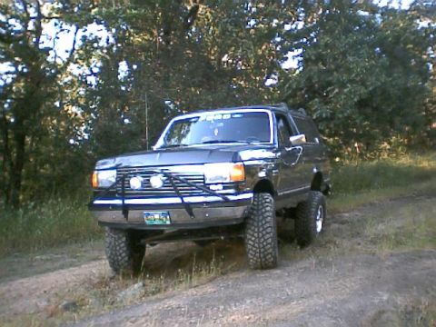 1988 Ford Bronco - This Ford Bronco appears to be from the late 1980s, likely a 1987 model, with modifications for off-road use.
