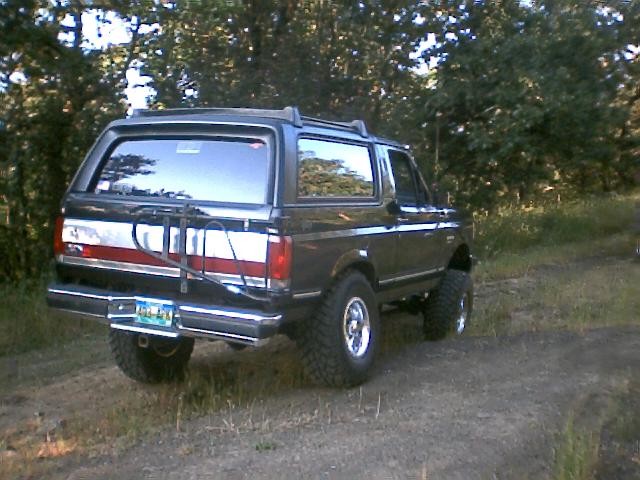 Black 1987 Ford Bronco rear view with bike rack