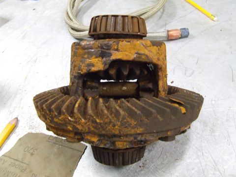 1967 Ford Bronco - A heavily rusted differential gear assembly is shown, with internal gears and external ring gear teeth visible.