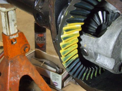 1967 Ford Bronco - Differential gears marked with yellow compound, likely for pattern checking during setup.