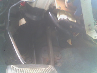 1983 Ford Bronco - Rare location of early engine control computer above gas pedal. It's an early cell phone pic, but it's the large black & white connector wi…