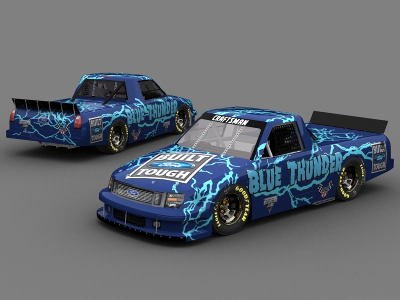 Two blue Ford race trucks with 'Blue Thunder' graphics and lightning bolts. One is in the foreground, the other in the background
