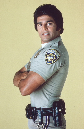 1996 Ford Bronco - Officer in uniform with California Highway Patrol badge on sleeve and duty belt.