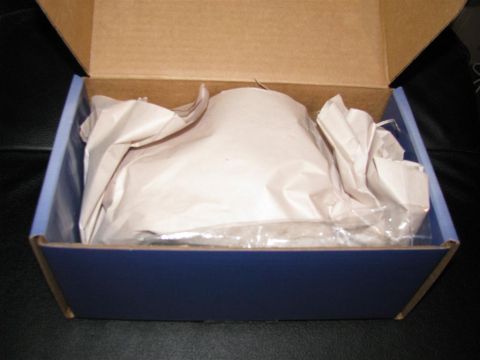 2003 Mercury Marauder - A BBK Twin 65MM Throttle Body is shown packed in its original blue box with protective paper.