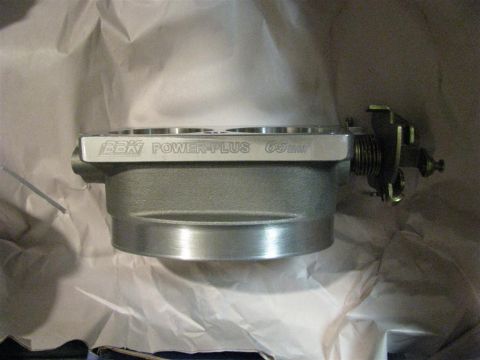 2003 Mercury Marauder - A BBK Power-Plus 65mm throttle body is shown, wrapped in white paper.