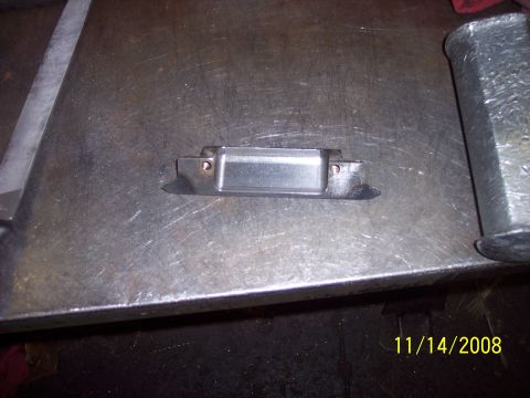 1960 Ford Falcon - A metal bracket with a rectangular opening is shown on a workbench, with a date stamp of 11/14/2008.
