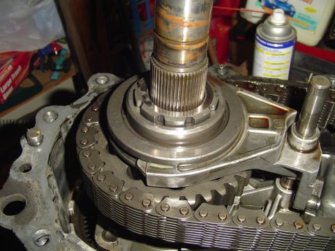 1993 Ford Bronco - This image shows the internal components of a vehicle's transfer case, including a chain and gears.