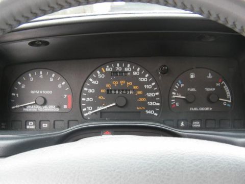 1993 Ford Taurus - Interior view of a 1993 Ford Taurus dashboard, showing the main gauges and controls.