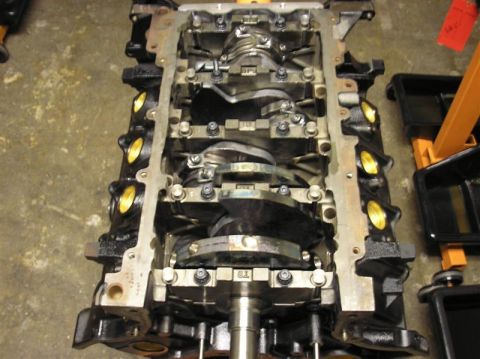 2007 Ford Mustang - Close-up view of an engine block, revealing the internal crankshaft mechanism.