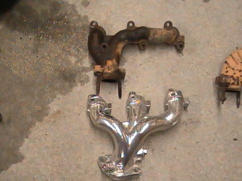 1990 Ford Probe - A comparison of a used exhaust manifold next to a newly chromed one.