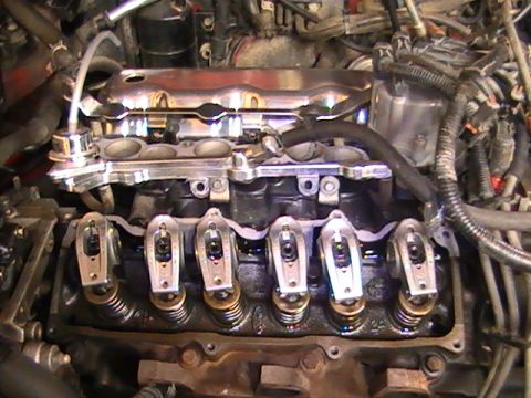 1990 Ford Probe - Engine valve train components, including rocker arms and springs, are shown in detail.