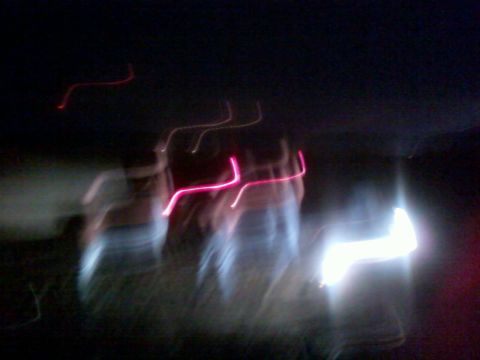 1996 Dodge 1500 - Abstract streaks of light suggest motion at night, with a watermark at the bottom right.