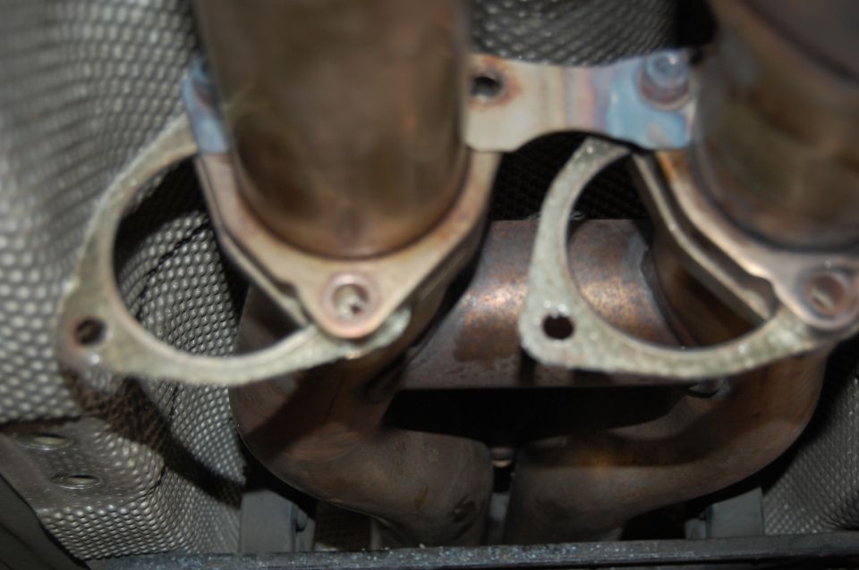 Exhaust manifold gaskets on a vehicle underside