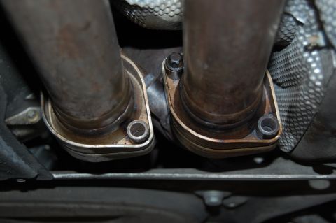 2002 BMW M3 - This photo shows the exhaust system's flanges and pipes, not a specific vehicle model year.