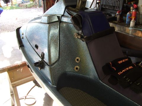 1998 Kawasaki JH1100-A4 1100 ZXi - Interior view of a blue glitter jet ski, showing the seat and storage compartment.