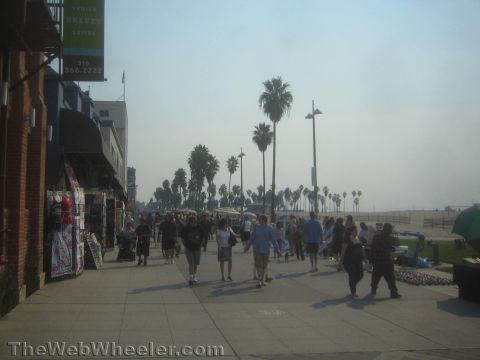 1968 Ford Mustang - Photograph of the Venice Beach boardwalk, not a technical document.