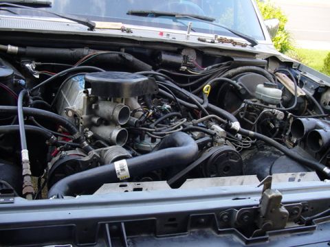 1987 Ford Bronco - theres the new motor, waiting for its headers to come.