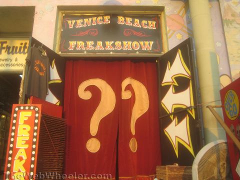 1968 Ford Mustang - photograph of a sideshow attraction storefront, not a technical document.