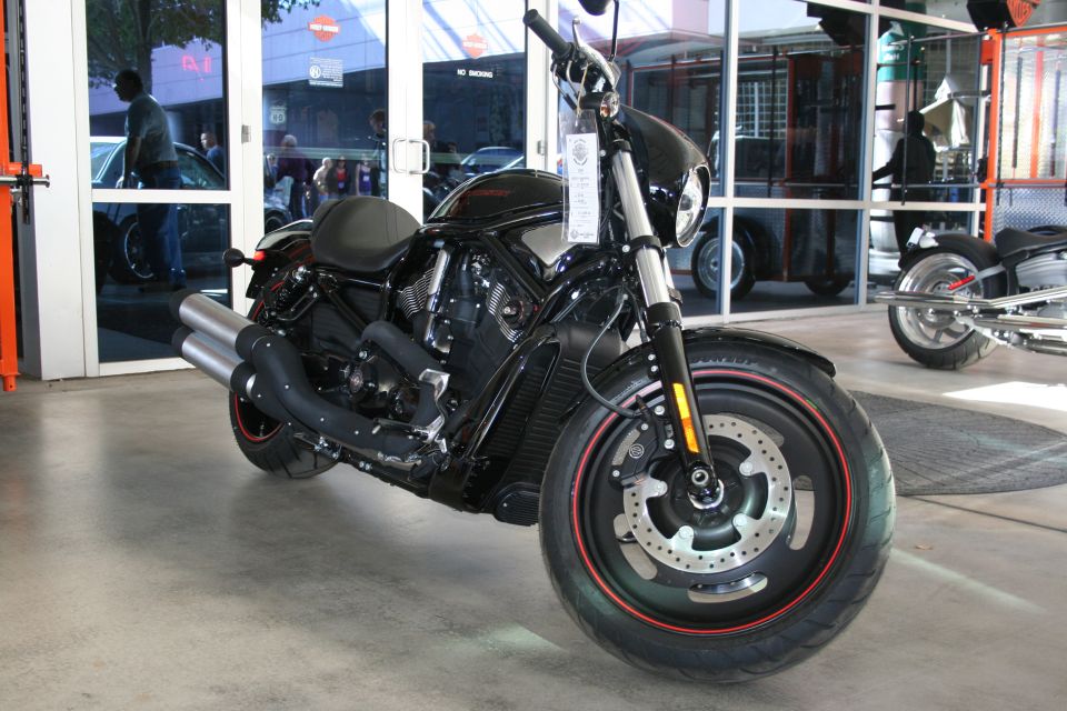 Black Harley-Davidson V-Rod Night Rod motorcycle in a showroom