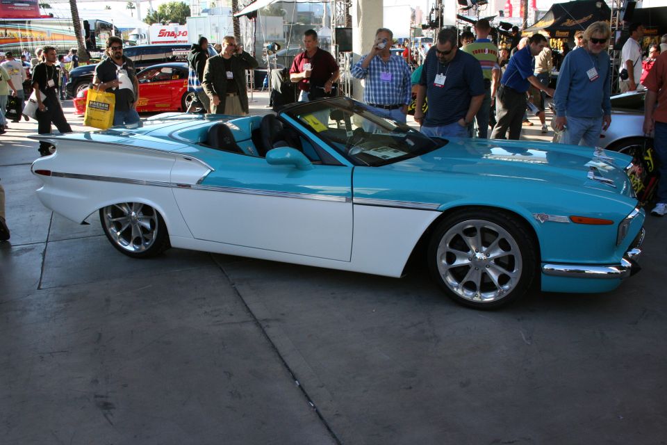 Two-tone blue and white custom convertible with fins and modern wheels