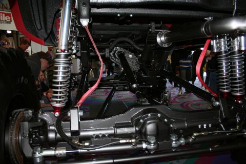 1998 Ford Crown Victoria - The complex undercarriage of a heavily modified vehicle is shown, custom suspension components.