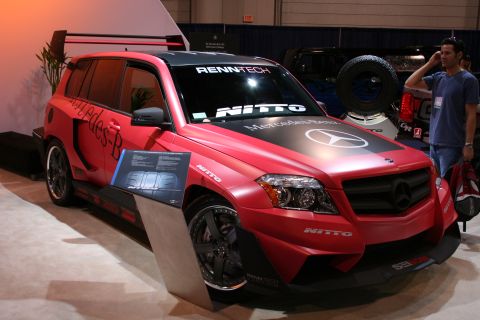 1998 Ford Crown Victoria - A modified Mercedes-Benz GLK SUV is displayed with racing decals and aerodynamic enhancements.