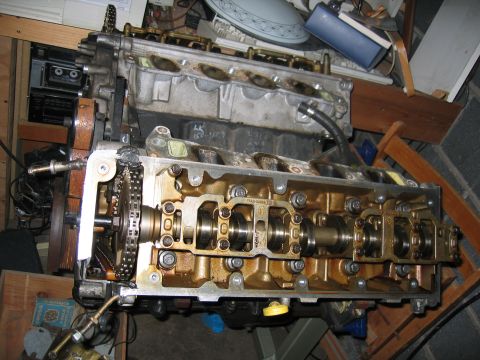 1996 Ford Crown Victoria - Close-up view of an engine's internal components, including camshafts and timing chain.