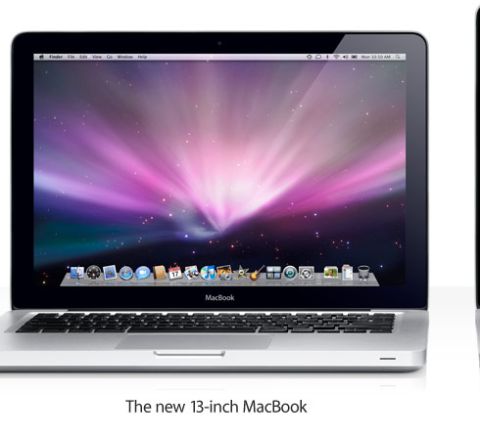 1985 Ford Bronco - A silver MacBook laptop is shown with a vibrant, starburst-like wallpaper on its screen.