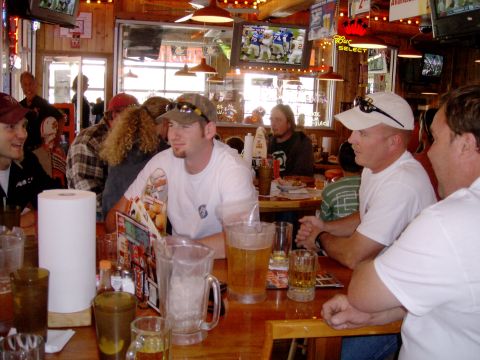 1984 Ford Bronco - A group of friends enjoy drinks and a game at a sports bar.