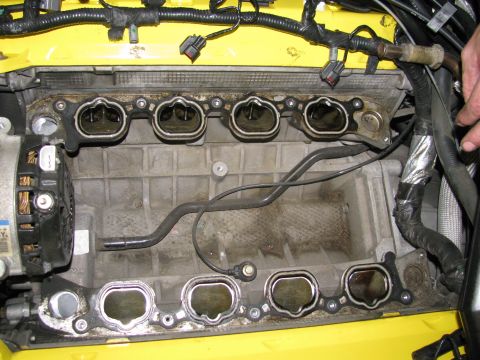 2003 Mercury Marauder - Close-up view of an engine's intake manifold, showing the ports and surrounding components.