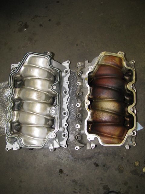 2003 Mercury Marauder - Comparison of a clean, ported and polished intake manifold next to a dirty one.