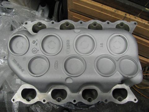 2003 Mercury Marauder - An aluminum intake manifold is shown, with visible Ford branding and part numbers.