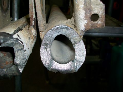 1992 Ford F-350 - This appears to be a fractured suspension part, possibly from a truck or heavy equipment.