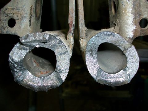 1992 Ford F-350 - These suspension components show significant damage and fracture, indicating a failure.