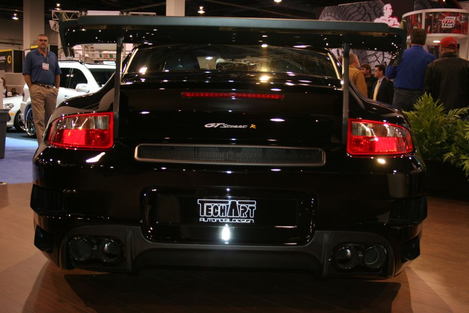 Black Porsche 911 GT2 with large rear spoiler and TechArt badging