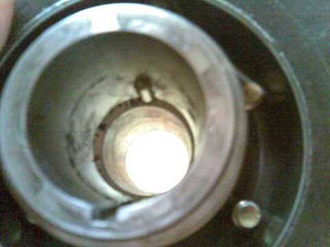 1972 Ford Ranchero - This image shows a close-up view of a cylindrical component, possibly from a vehicle's engine or drivetrain, with internal details visible.