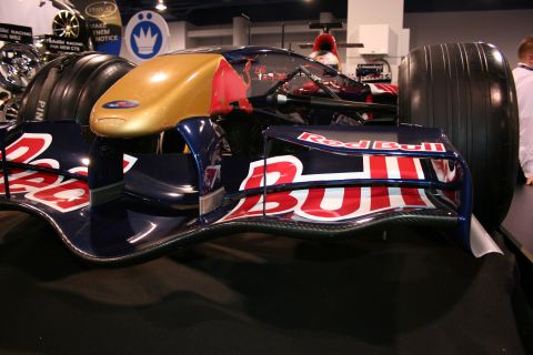 Red Bull Formula 1 car with blue, red, and gold livery, front view