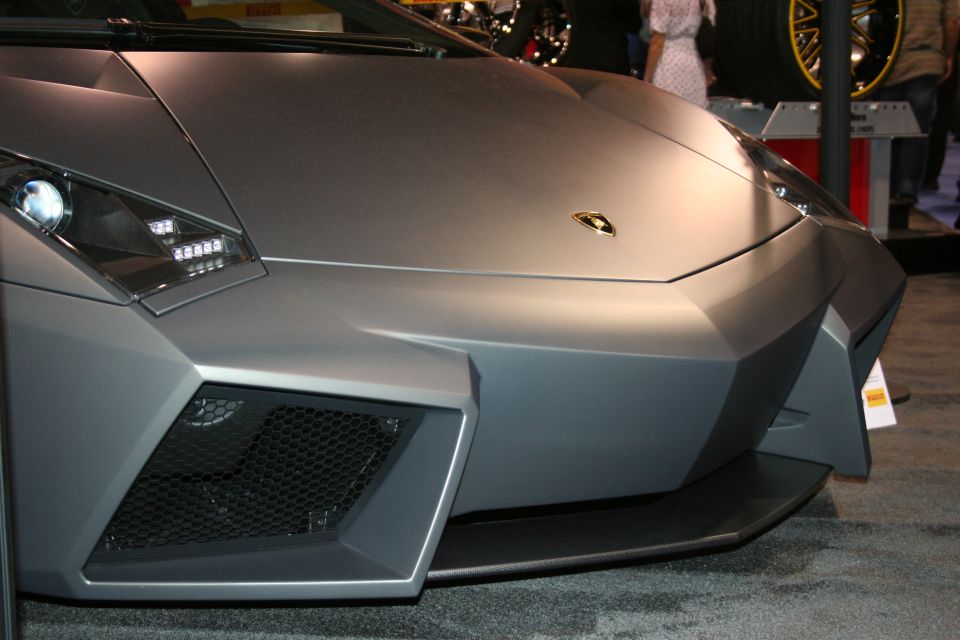 Matte gray Lamborghini Aventador front end with sharp angles and LED headlights