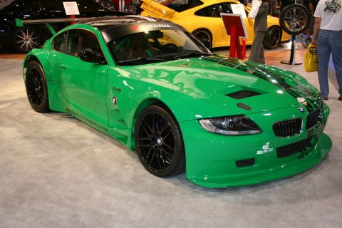 Front three-quarter of a green widebody BMW Z4 show race car